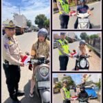 Personel Polres Labuhanbatu Selatan Bagikan Bendera Merah Putih Sambut Hari Kemerdekaan