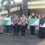 Kapolres Kuansing Serahkan Simbolis Kartu BPJS Ketenagakerjaan Kepada PPPK Dan PHL