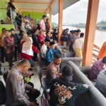Polres Kuansing Pastikan Hari Pertama Pacu Jalur Rayon III Di Benai Berlangsung Aman, Ribuan Penonton Padati Arena