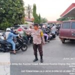 Sosok Aiptu Elpino Tanio Hadir Mengurai Kepadatan Lalu Lintas, Di Tengah Kemacetan Dan Antrean Pengisian BBM
