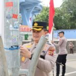 Polres Sabang Pasang Bendera Merah Putih di Kilometer Nol, Sambut HUT RI ke-81