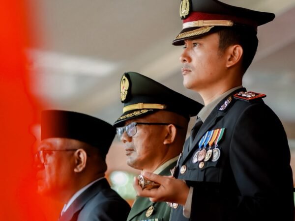 HUT RI Ke-81, Kapolres Kuansing Hadiri Upacara Detik-Detik Proklamasi Di Lapangan Limuno