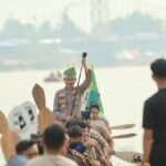 Kapolres Kuansing Menjadi Timbo Ruang Jalur Eksibisi, Semarakkan Pacu Jalur Event Nasional 2026